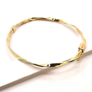 бутикова златна гривна , изискана изработка от 14 карата злато с акцент  вълнеобразен плавен вретеновиден дизайн ,супер полирана за повече блясък