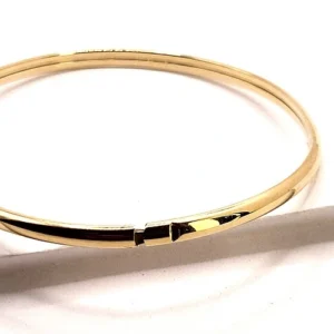 изискана твърда златна гривна от 14 к злато .Изчистен семпъл дизайн със скрит механизъм за отваряне. Супер полирана за повече блясък .Злато проба 585