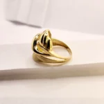 Модерен дамски златен пръстен в голям размер без камъни. Съвременен дизайн, подходящ за ежедневна употреба и специални поводи.